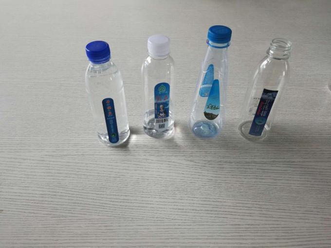 آلة لصق الملصقات على الزجاجات البلاستيكية لمعدات وضع العلامات على زجاجات المياه