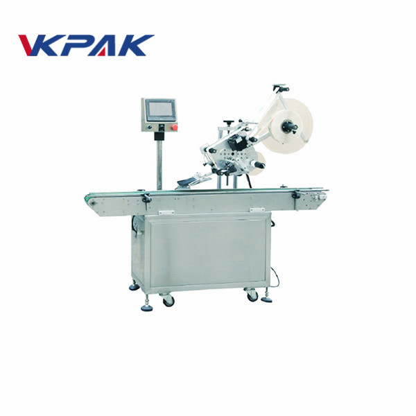 آلة لصق ملصقات ذاتية اللصق للجانب العلوي لبنة الثلج